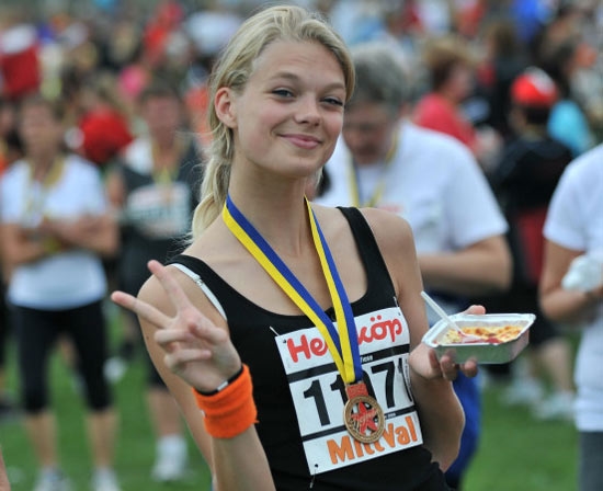 Locandina e foto Tjejmilen 2009